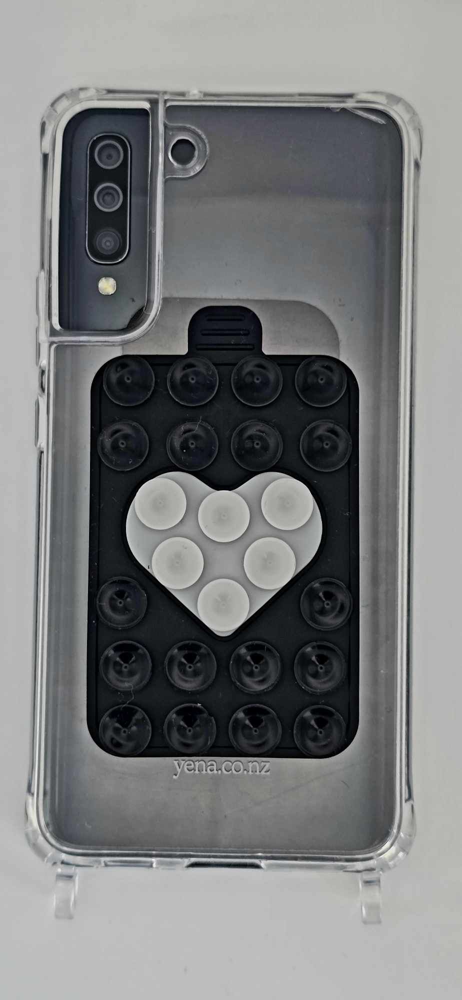 Cell phone suction pad