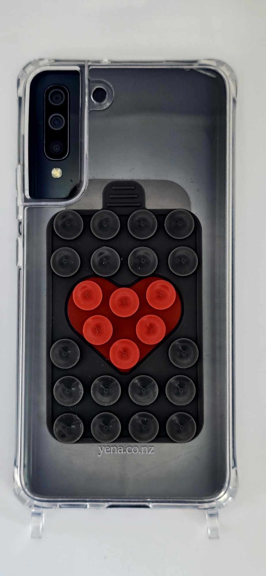 Cell phone suction pad