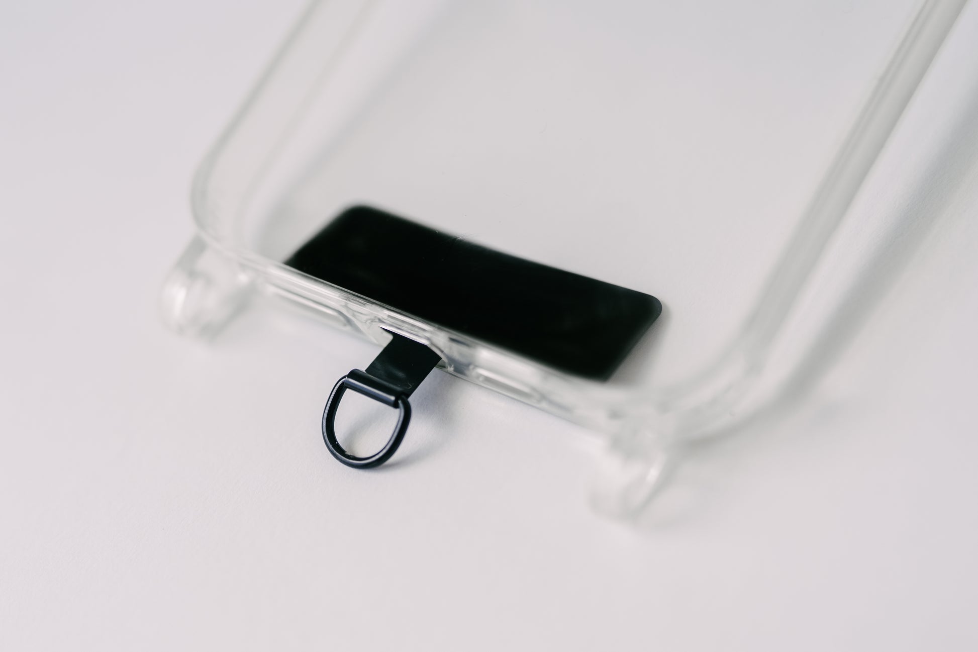 Phone tab through charging port